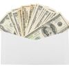Money in an envelope. On a white background.