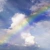 Abstract rainbow on the sky with clouds