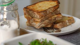 Toasted Bread Served In Plate On Table