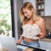 Young woman is purchasing online at home