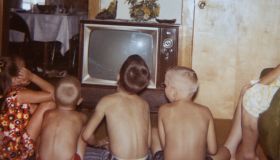 Neighborhood kids watch television, ca. 1969.
