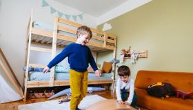 Two little boys playing in their room